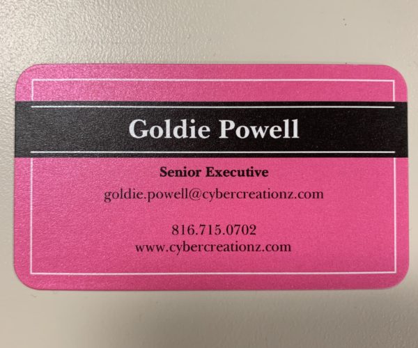 Goldie front Business card